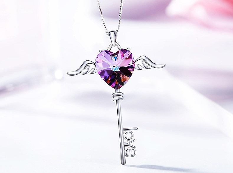 Sterling silver sapphire winged key necklace - CDE Jewelry Egypt